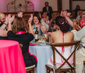 table guests clapping